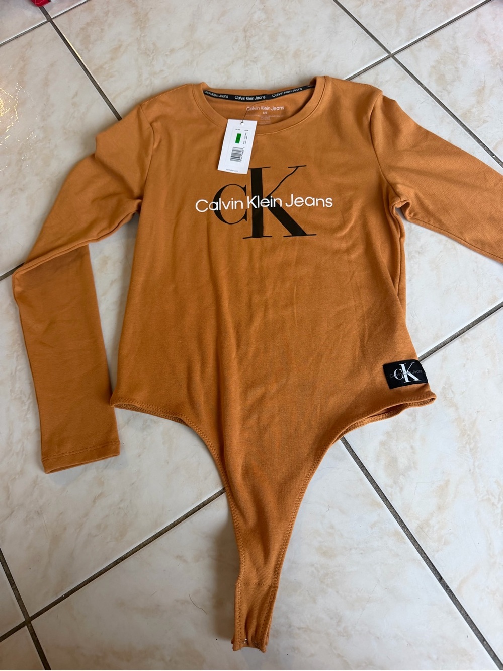 Calvin Klein Jeans Long-Sleeve Bodysuit in Rust